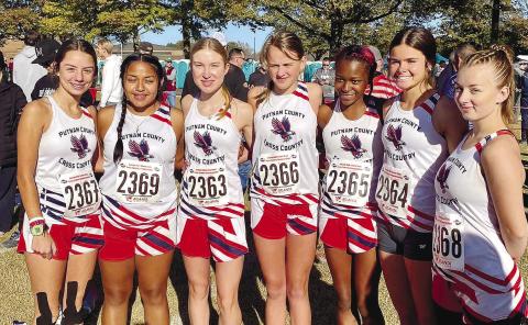 The Lady War Eagles pose for a picture Nov. 4 before the start of the Class AA cross-country race in Carrollton. CONTRIBUTED