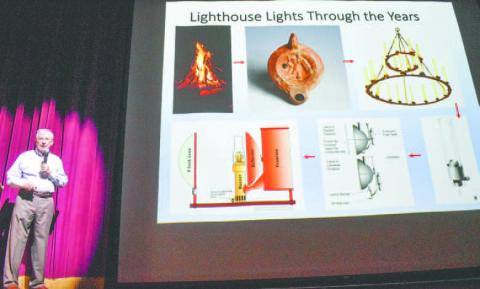 Dr. William Rawlings discusses lighthouse lights over the years. ILENA HENSLEY/Staff