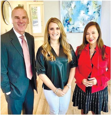 Ted and Riezl Baker welcome real estate veteran Leslie Clark (center) to their sales team at Luxury Lake Oconee Real Estate Group. CONTRIBUTED