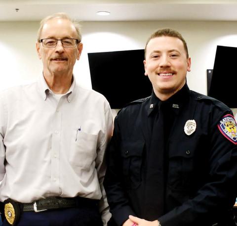 Early this month at a scheduled Eatonton City Council meeting, Eatonton Police Chief Howell Cardwell (left) introduced Officer Mitch Jimenez to council members as his latest addition to the force. Jimenez told council members he’s enjoying the job here and looks forward to helping others and getting involved locally. IAN TOCHER/Staff