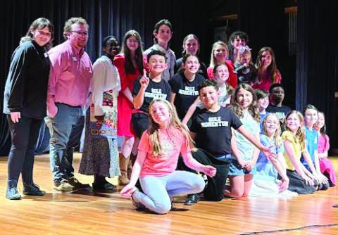 The talent and staff that made the Cocoa House possible come together after their final bow.