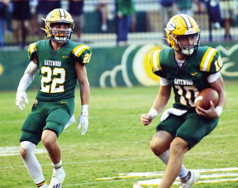 Gatewood senior Hunter Johnson (22) had a career night at Mount de Sales last Friday, rushing for 325 yards and scoring five touchdowns in a 46-20 win for the Gators. Meanwhile, quarterback Ames Johnson (10) had 12 carries for 96 yards and threw a touchdown pass to junior wide receiver Ben Brannen. FILE PHOTO