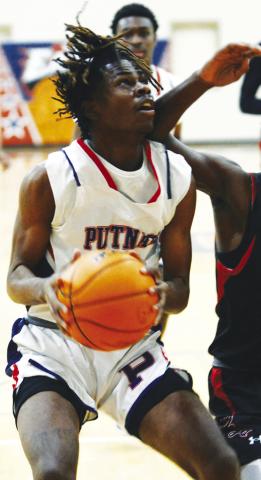 Putnam County’s Shamar McClendon (12) contributed 11 points to the War Eagles victory. IAN TOCHER/Staff
