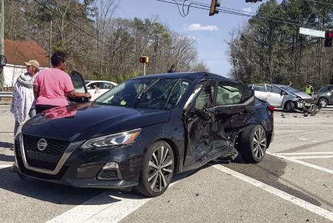 A driver who ran a red light at the intersection of Pea Ridge Road, Twin Bridges Road and U.S. Hwy. 441 crashed into this car. Air bags apparently saved the car’s occupants from being seriously injured. MATT SMITH/Staff