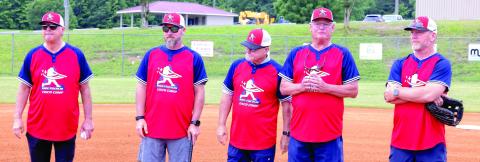 Former Major League Baseball players (l-r) Mike Fischlin, Stephen Drew, Glenn Hubbard, Bruce Benedict and J.D. Drew pose for photos next to Field 3 at the Greene County Recreation Complex during last year’s Fisch Camp. FILE PHOTO