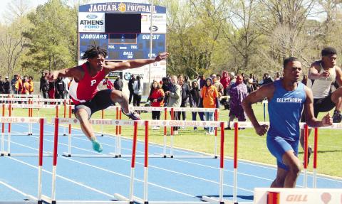 A Putnam hurdler competes at the region track meet. ARELLA CASH/Staff