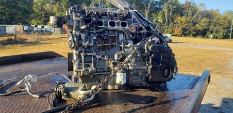 The motor of the Ford Escape sits atop a wrecker. The impact of the crash knocked the motor completely out of the vehicle. CONTRIBUTED