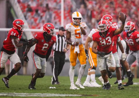 Georgia defensive lineman Tyrion Ingram-Dawkins (93) celebrates after picking up a fumble against Tennessee.