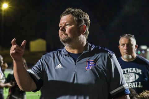 Putnam County head coach Shaun Pope talks to his players after a Region 4-AAA win over Josey earlier this season. LANCE MCCURLEY/Staff