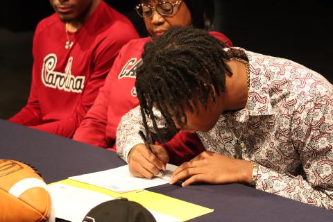 Kilgore signs his letter of intent in front of friends, family and peers. BRENDAN KOERNER/Staff
