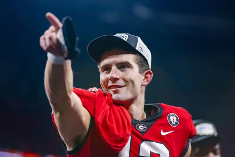 Georgia quarterback Stetson Bennett (13) after Georgia’s win in the 2022 SEC Championship Game at Mercedes-Benz Stadium in Atlanta, Ga., on Saturday, Dec. 3, 2022. (Photo by Tony Walsh)