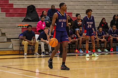Putnam County point guard Eren Banks (1) brings the ball up the court against Northside-Columbus in a game earlier this season. LANCE MCCURLEY/Staff