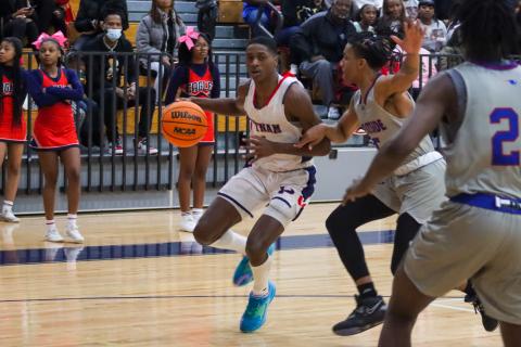 War Eagles’ guard Eren Banks (1) tries to use the baseline to his advantage during a Region 4-AA game against top-ranked Westside on Friday night. The senior finished with 23 points. LANCE McCURLEY/Staff