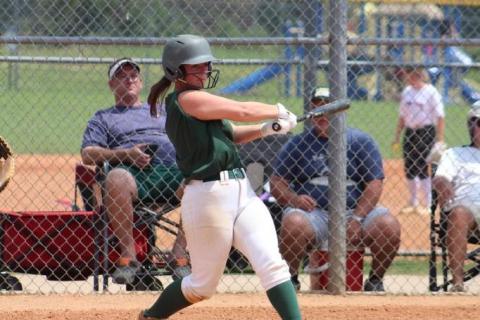 A Gatewood softball slaps a single into right field during a scrimmage game this summer. CONTRIBUTED