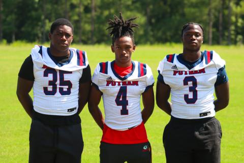 (L to R) Zacoree Wallace (35), Sharod White (4), and Rashod Daniel (3) look to be playmakers for the War Eagles in 2023. LANCE MCCURLEY/Staff