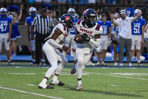 War Eagles’ defensive back Kavar Andrews (5) pursues Oconee’s Mac Little (12) while in coverage. LANCE MCCURLEY/Staff