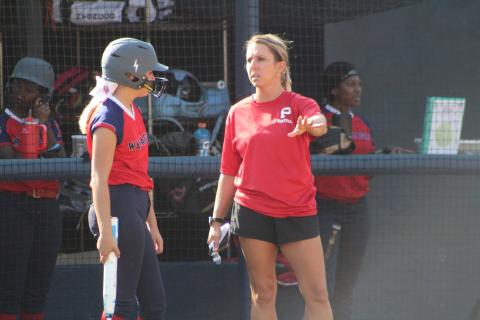 Putnam County head softball coach Mollie Jones talks with one of her players during a scrimmage over the summer. KIM CASH/Contributed