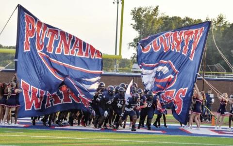 The Putnam County War Eagles take the field before facing Laney on Friday night. T. MICHAEL STONE/Staff