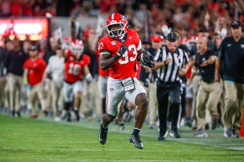 Georgia running back Chauncey Bowens rushes for a career-high 43-yard gain in the second quarter of last week’s game against Alabama. LANCE McCURLEY/Staff