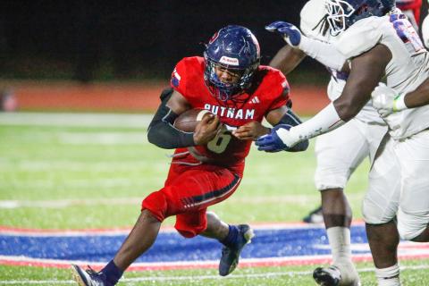Putnam County running back Omarion Butts (6) rushes for a touchdown during the second quarter of last Friday's game against Lamar County. LANCE MCCURLEY/Staff