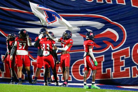 Putnam County football players get ready to lead the rest of the team out onto the field before the game against Lamar County on Oct. 17. LANCE McCURLEY/Staff