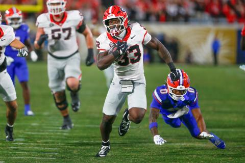Georgia’s Chauncey Bowens (33) led the team in rushing last week with 70 yards on nine attempts and a touchdown against Florida. LANCE McCURLEY/Staff