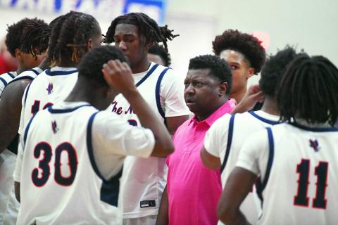 Putnam County coach Patrick Marshall talks with his team during a timeout in a game against Lamar County on Jan. 28. IAN TOCHER/Staff