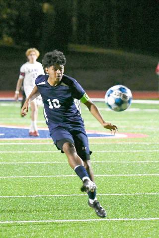 Putnam County senior midfielder Angel Sanchez (10) chases after a ball as he tries to score in a match against Jasper County on March 13. IAN TOCHER/Staff