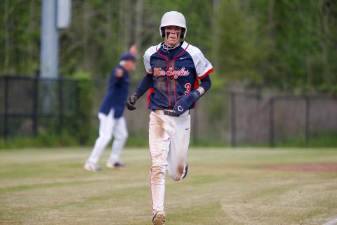 Trace Watkins rounds the bases and scores safely. LANCE MCCURLEY/Staff
