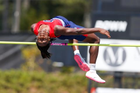 Putnam County senior Bill Waters attempts a jump in the high jump at last week’s region track meet in Social Circle. LANCE MCCURLEY/Staff