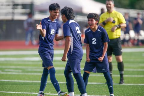 Putnam County's Reynaldo Espinoza (16) and Edwin Garcia (2) celebrate with teammate Jonathan Acostas (9) after he scored a goal last week against Vidalia. LANCE MCCURLEY/Staff