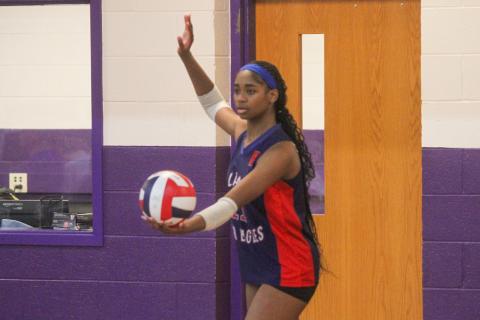 Freshman Avery Abrams prepares to serve for the War Eagles. BRAD HARRISON/Staff