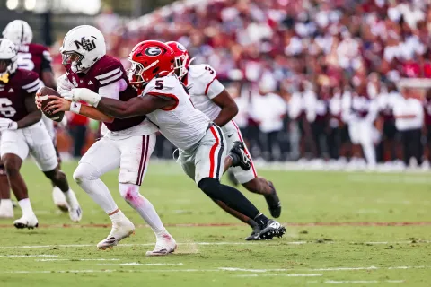 Georgia inside linebacker Raylen Wilson (5) tackles Mississippi State quarterback Blake Shapen during a game in Starkville last season. LANCE McCURLEY/Staff