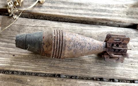 Photo cutline: One of two mortar rounds that were discovered on hoarded property on Clubhouse Road.  (CONTRIBUTED/SHERIFF SILLS)