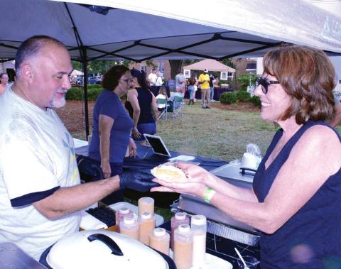 Smiles come easy at Taste of Eatonton, scheduled for Oct. 7 this year at The Plaza. CONTRIBUTED