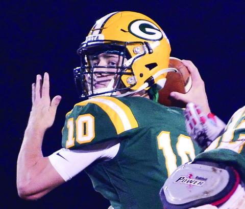 Gatewood quarterback Ames Johnson drops back to pass during a game last season. (File Photo)