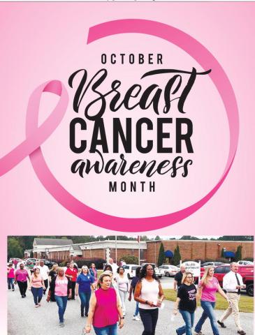 Led by Putnam County Manager Paul Van Haute (far right), approximately 30 attendees to a Breast Cancer Awareness event Oct. 6, went on a reflective walk around the surrounding facilities at the county administration building.