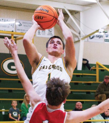 Gatewood senior Ames Johnson had a solid game for the Gators Monday night in his first game back as a basketball player since he was a freshman. IAN TOCHER/Staff