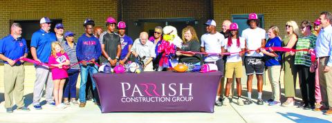 Board of Education members Eugene Smith and Carol Ann Gunthrie cut the ribbon. CONTRIBUTED