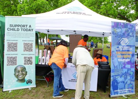Pete Nance Boys & Girls Club tent was kept busy throughout the day. LEIGH LOFGREN/Staff