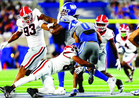 The defense kept Georgia in the game despite being short-handed. Tyrion Ingram-Dawkins (93) recorded two tackles for loss and a sack. oenel Aguero (8) recorded three solo tackles. CONOR DILLON/UGAAA