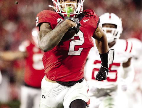 Senior running back Kendall Milton (2) had the breakout game of his career against Ole Miss in Athens, rushing for 127 yards and two touchdowns on nine carries. ZAK ROBINSON PHOTOGRAPHY/Contributed