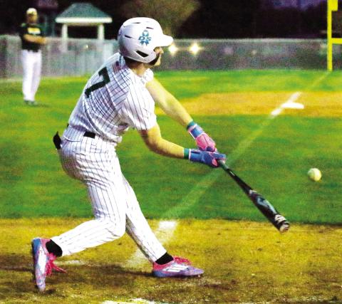 Gatewood senior Ames Johnson drives a ball the opposite way. TREY NORRIS/Staff