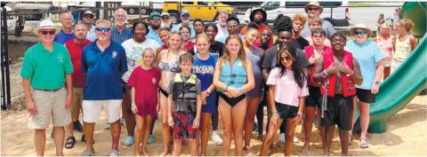 Sta_ and youth residents of the Masonic Home of Georgia joined local Masons from Eatonton Aug. 20, at Oconee Springs Park. IAN TOCHER/Staff
