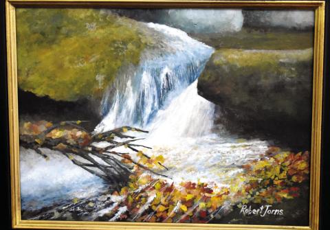 A piece called “Fall Leaf Dam” by Robert Jorns. Jorns picked the pieces of his exhibit based on landscapes he felt best represented the area. CONTRIBUTED