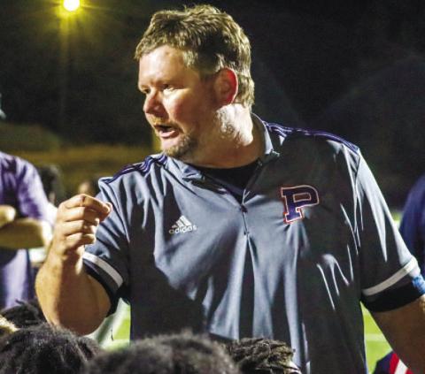 Putnam County head coach Shaun Pope talks to his players after a Region 4-AAA win over Josey earlier this season. LANCE MCCURLEY/Staff