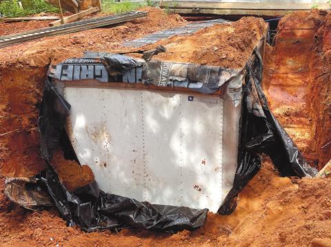 The stolen box truck body was covered in waterproof tarp before it was buried. CONTRIBUTED/Sheriff Howard Sills