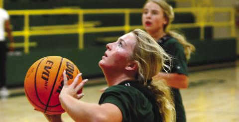 Gatewood rising 10th-grader Lily Huskins attempts a jump shot during Tuesday’s practice. IAN TOCHER/Staff