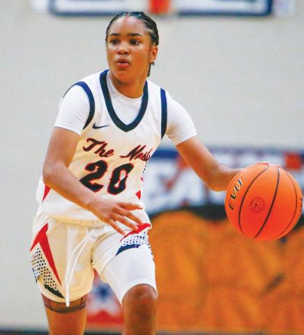 Putnam County freshman guard Jaydah Baker (20) has proved to be a player the Lady War Eagles can rely on down the stretch. LANCE McCURLEY/Staff