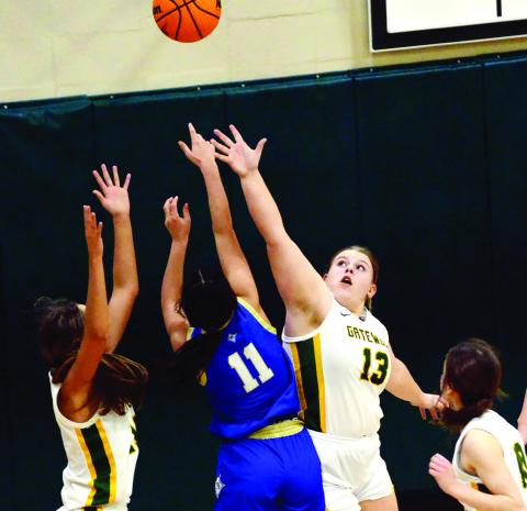 Gatewood senior London Darden (left) is joined by freshman Avery Hill (13) in defending the basket last Friday versis Brentwood. IAN TOCHER/Staff
